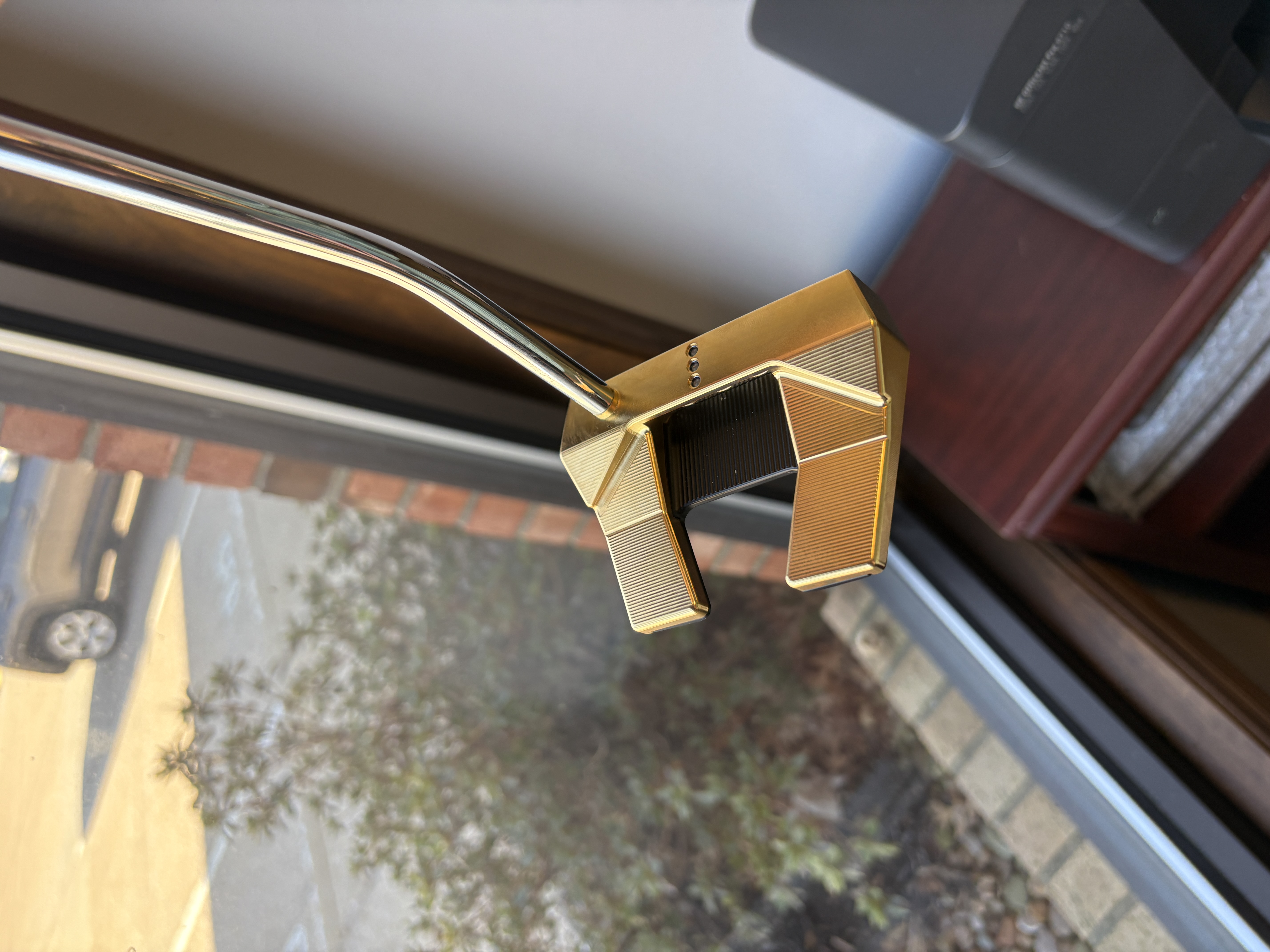 Gold plated putter 1